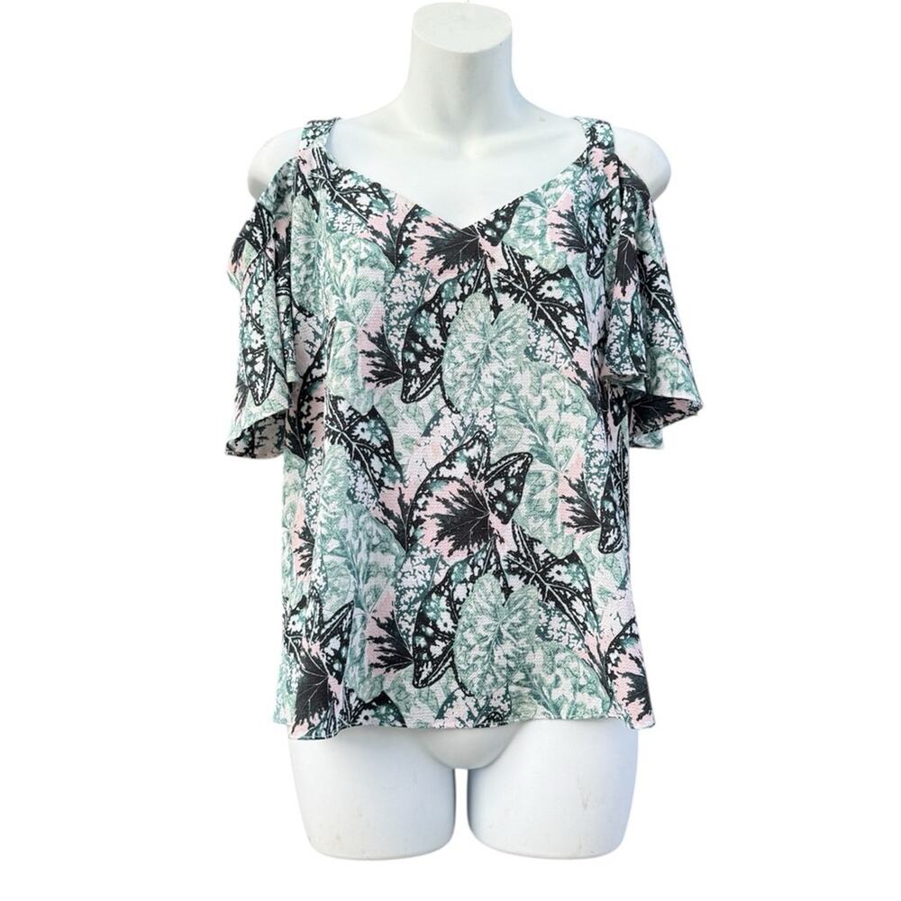 Bebe cold-shoulder top with a leaf-pattern design